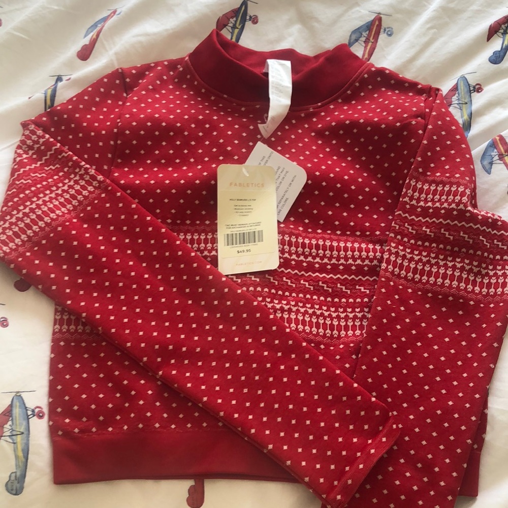 Brand new fabletics holly seamless top.  Never worn. Tags still attached.